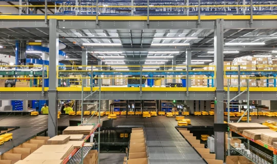 Comparing AS/RS and AGVs: Choosing the Right Automation for Your Warehouse