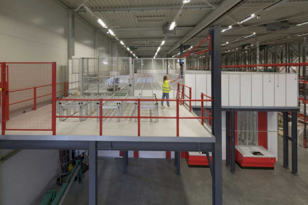 mezzanine integrated with autostore